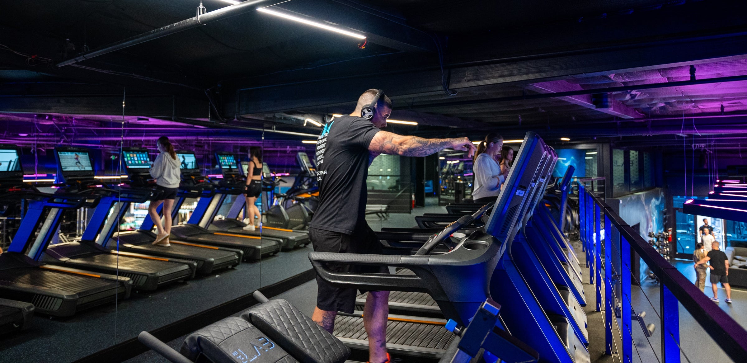 Coach Paul punching on a treadmill